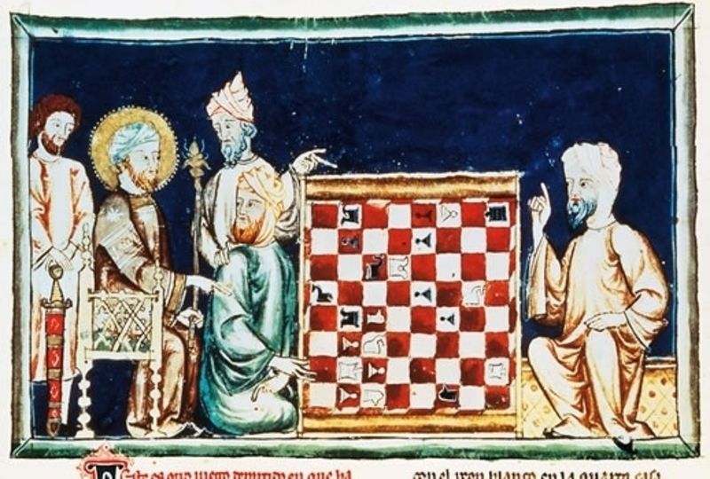 Two peopel show a chessboard