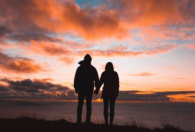 A couple enjoying a sunset