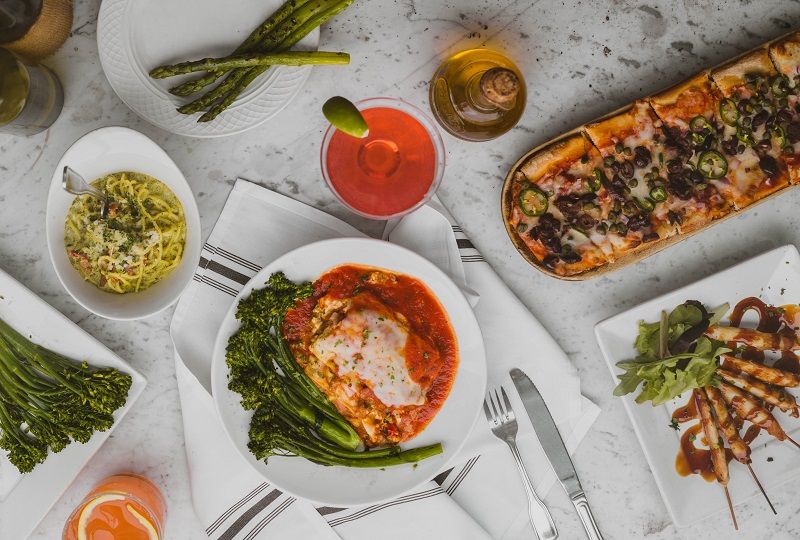 A Table Laid With Italian Food