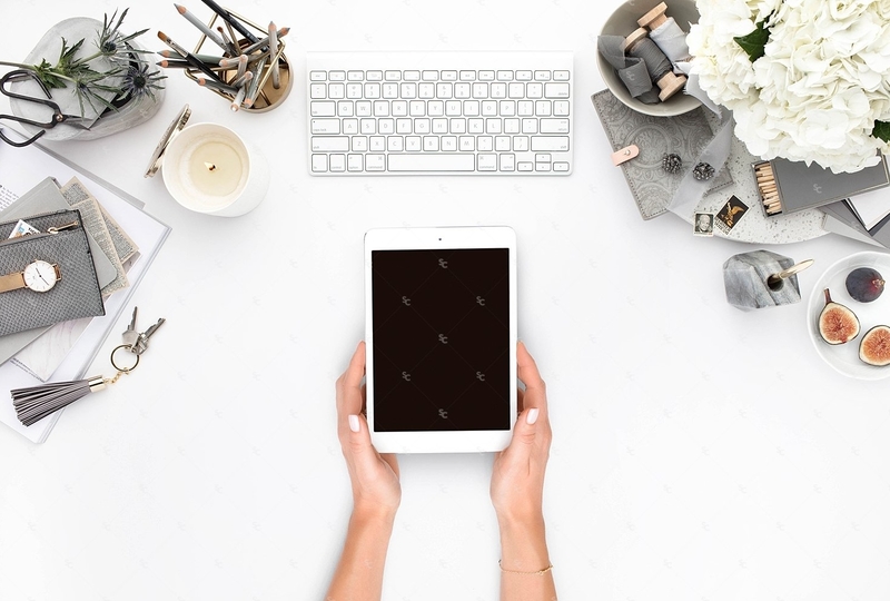 A woman working on tablet