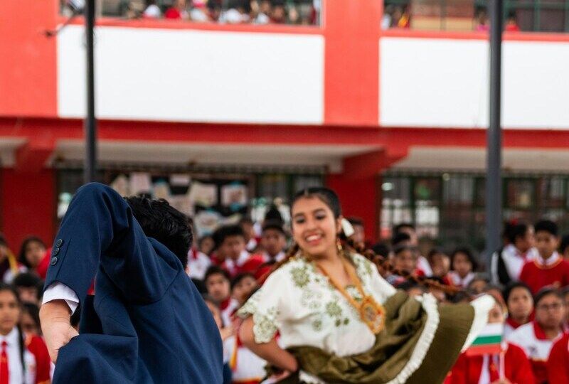 Two young Peruvians dance