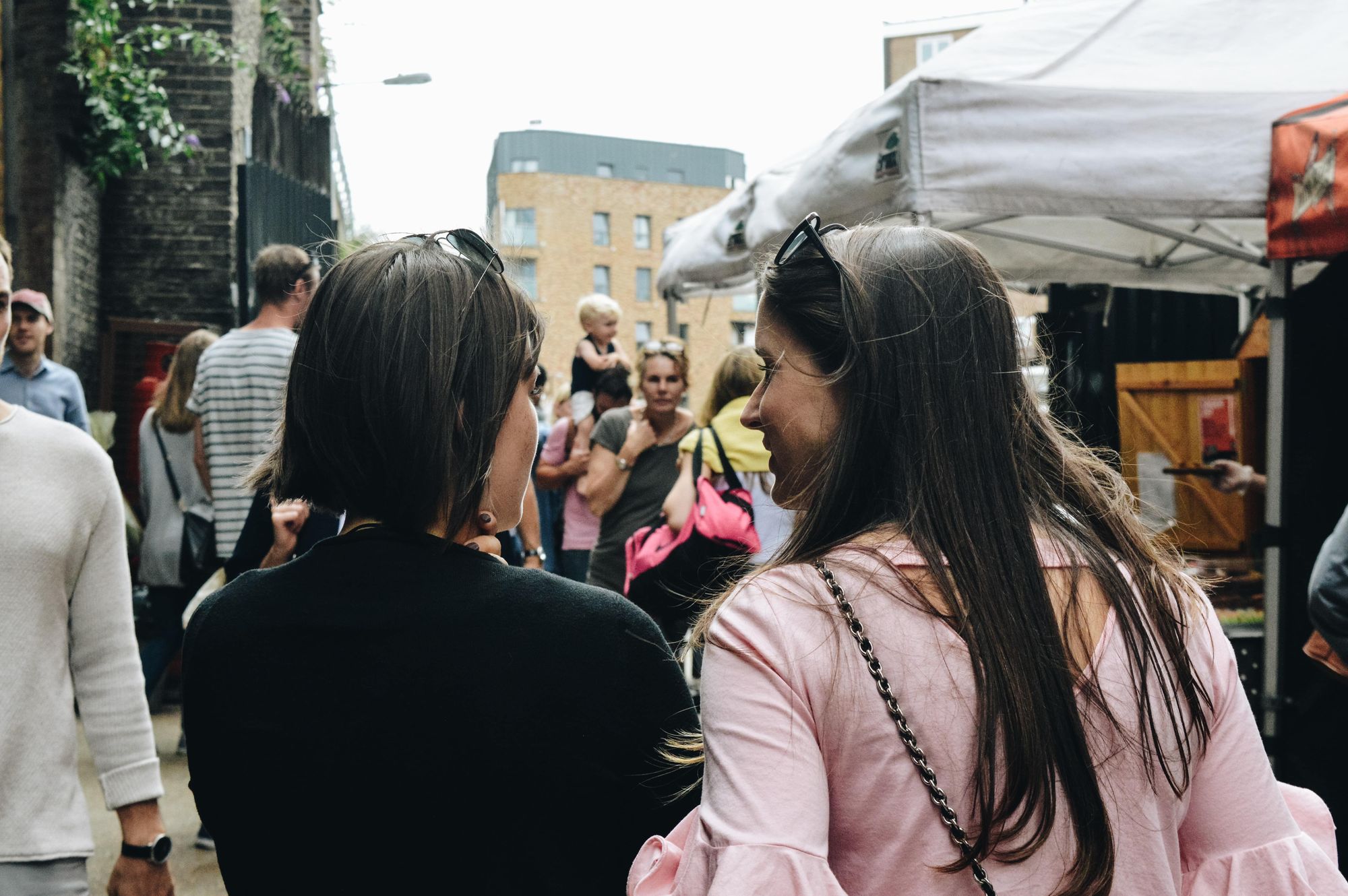 Two friends chatting on the street