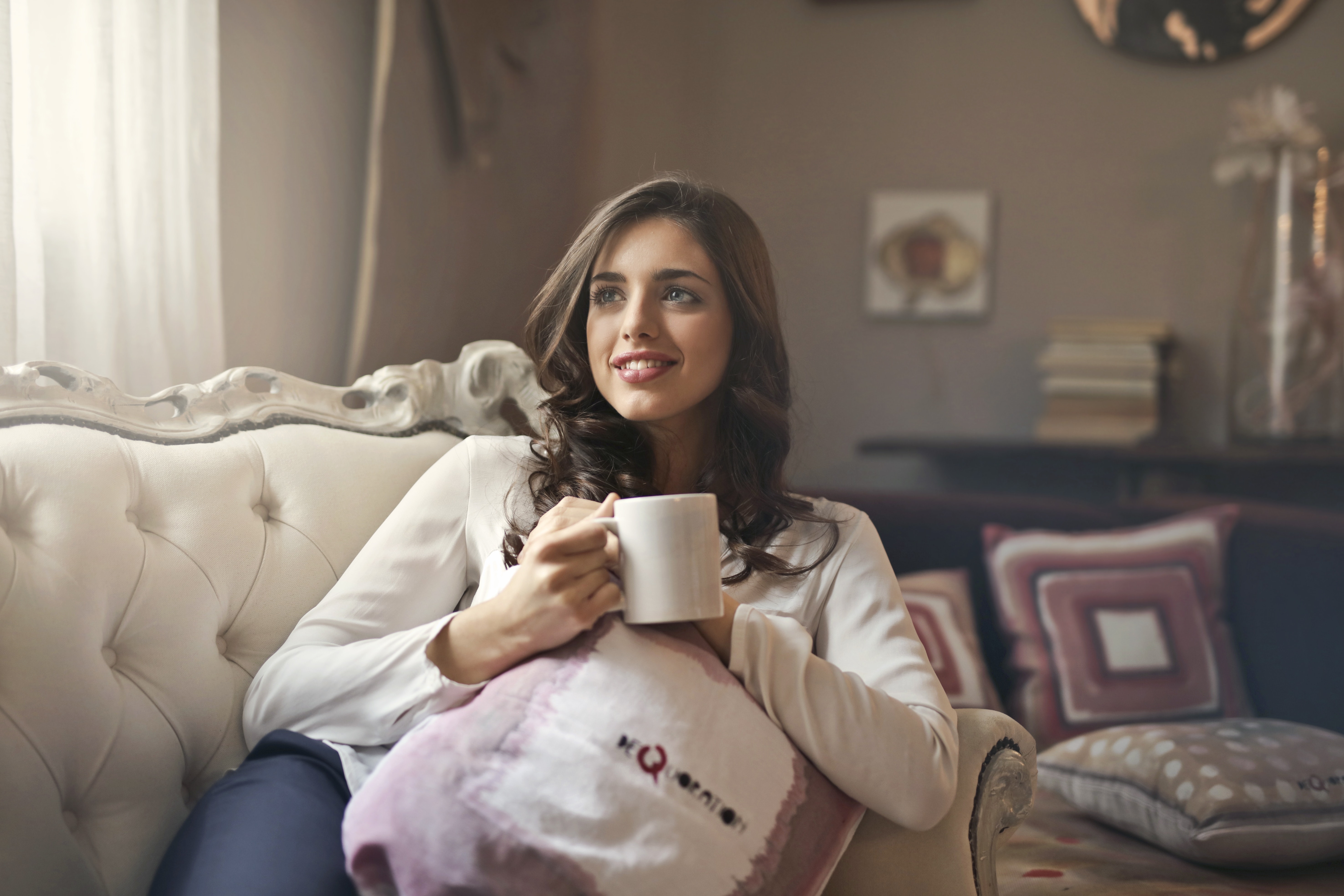 woman sitting on couch