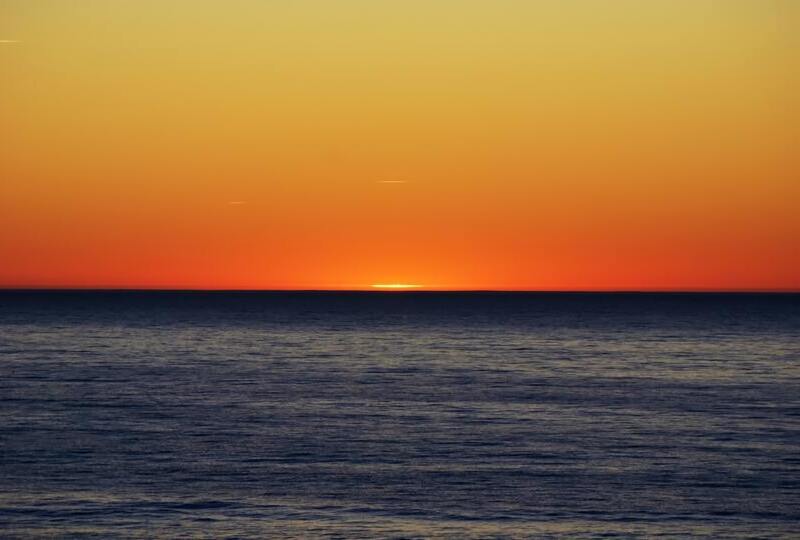 A sunset on a beach