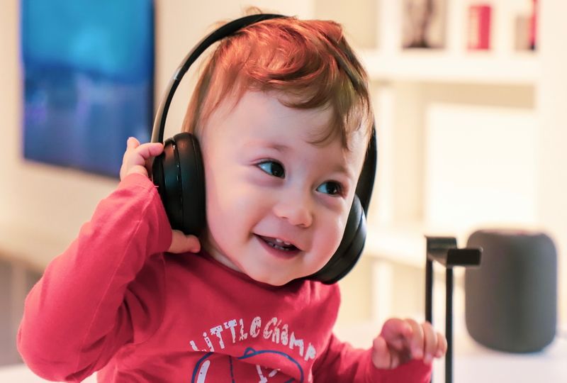 child listening to music