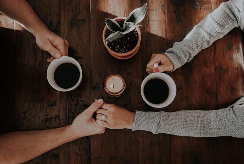 Couple holding hands