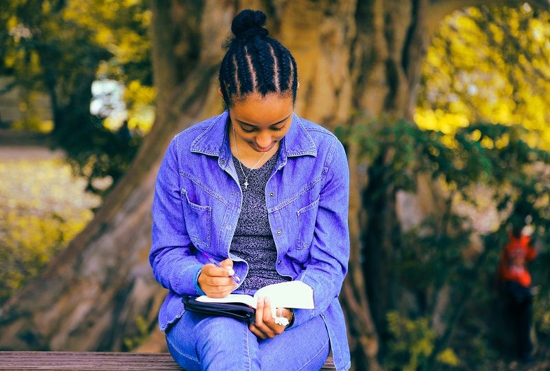 A woman practising Italian writing