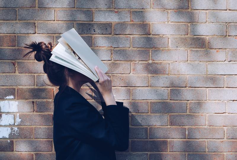 Girl holding book