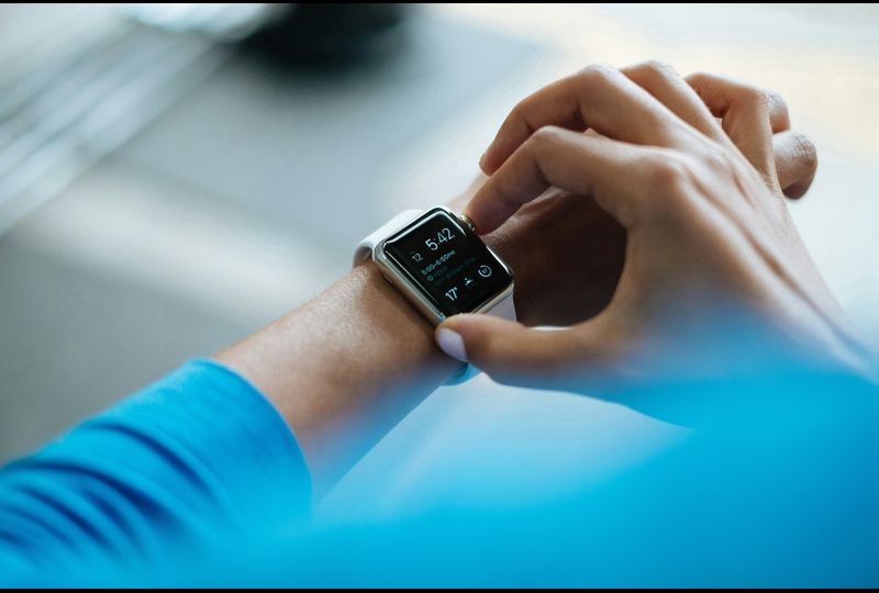 Man looking at his apple watch