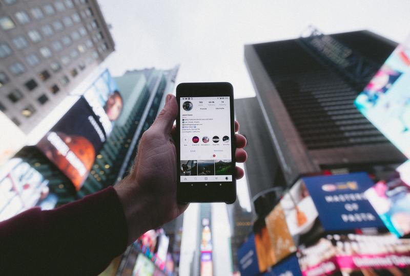 Man holding phone up