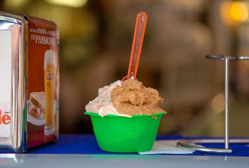 Gelato in a cup on a counter