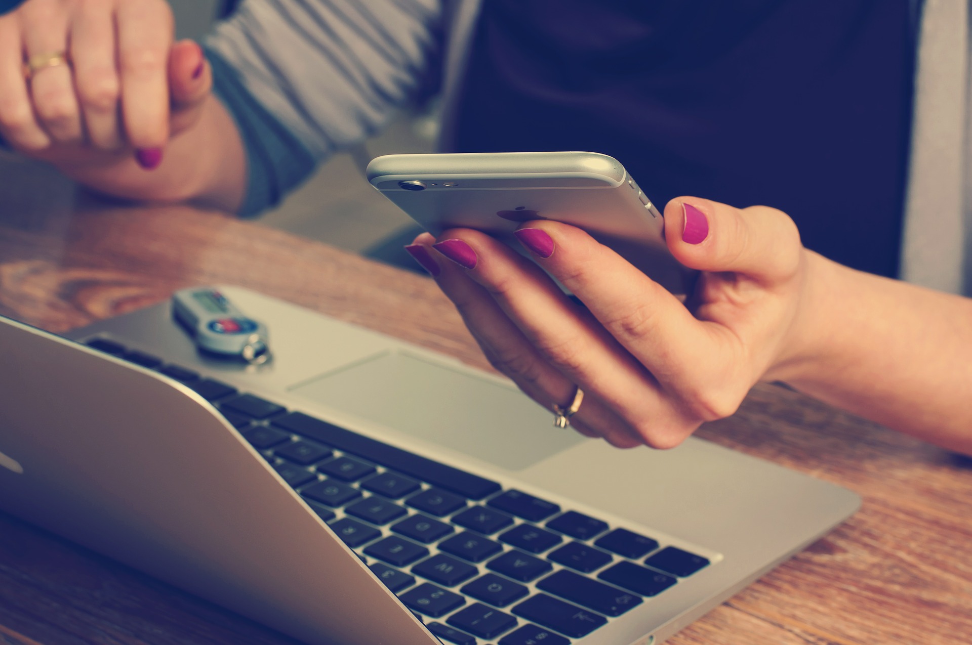 woman holding a phone