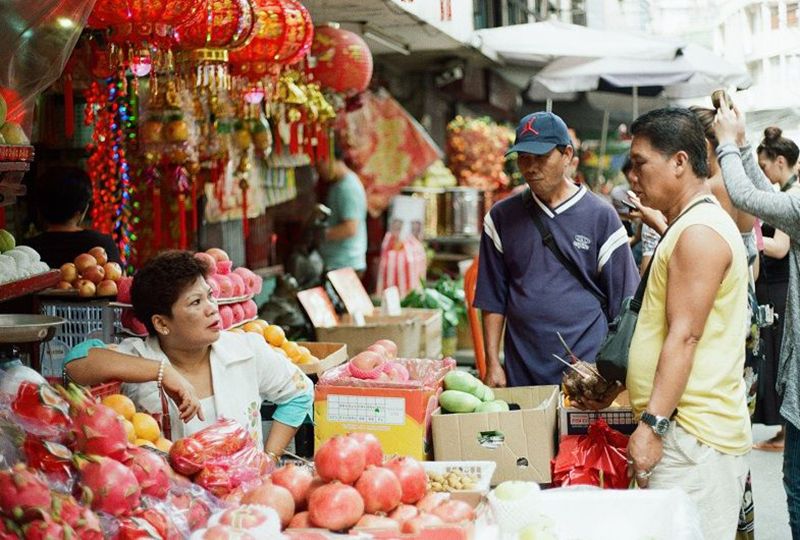 People haggle in a market