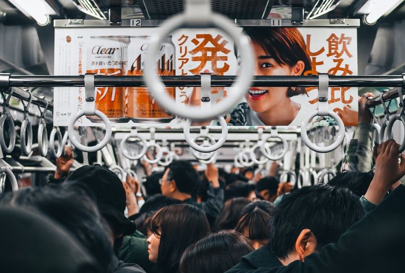 people standing inside train