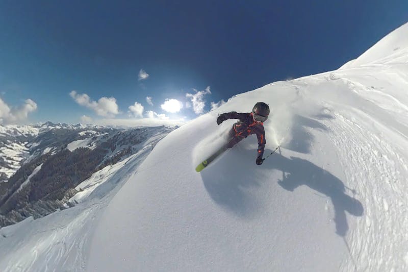 Skier on top of mountain.