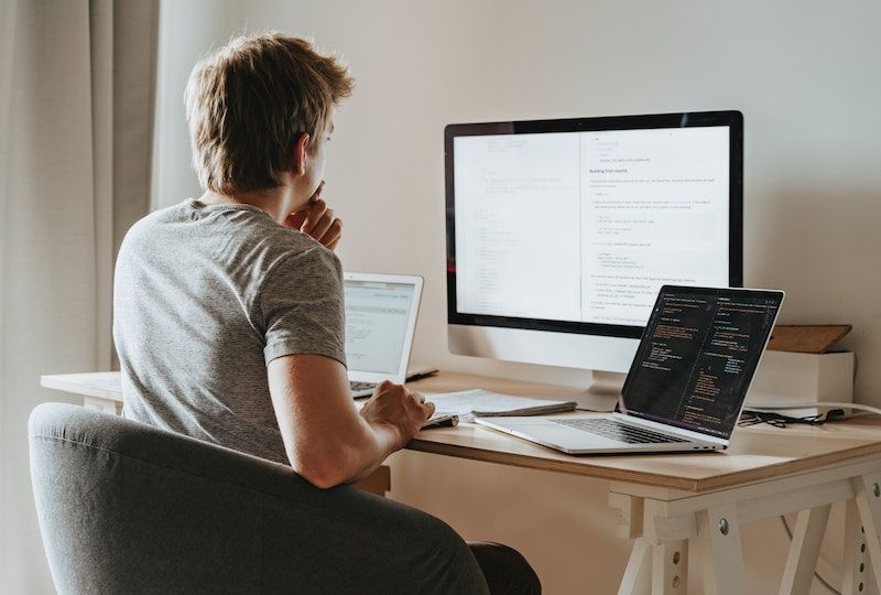 Man sitting in front of computer