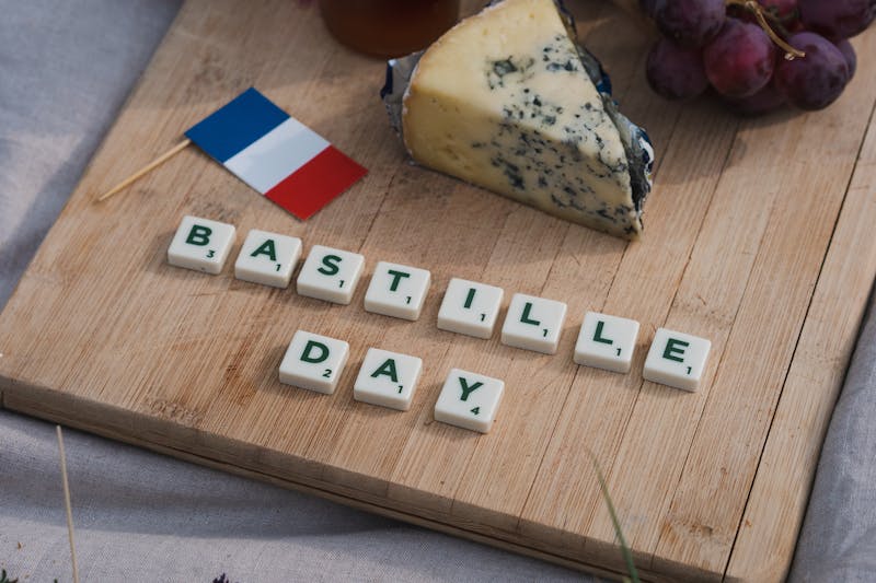 Bastille Day written on charcuterie board.