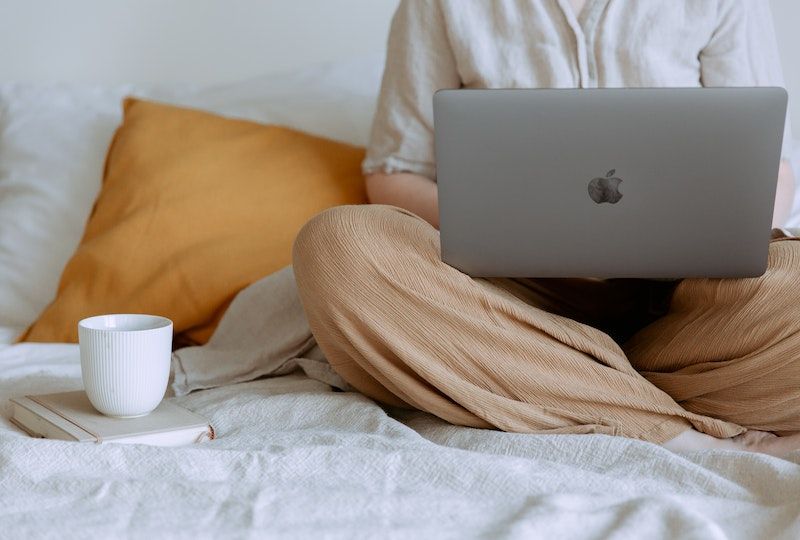 Person studying on laptop.