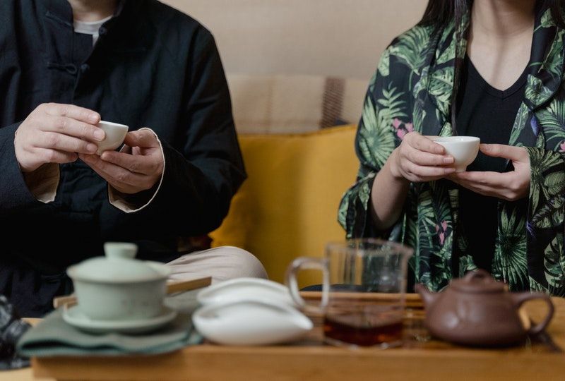 two people having tea