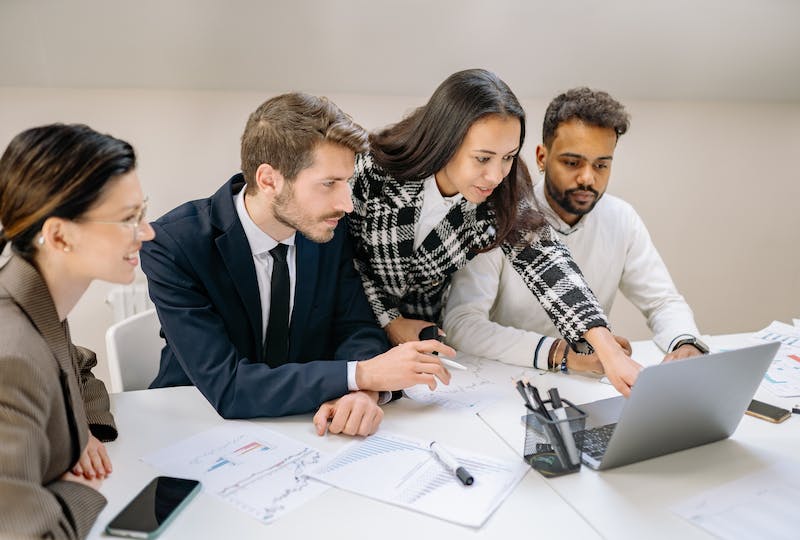 Professinoals conversing in an office