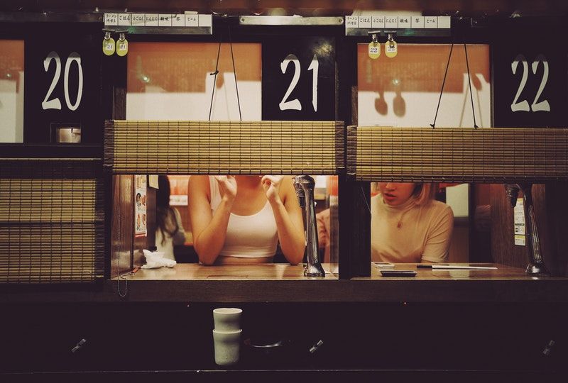 photo of two women in restaurant