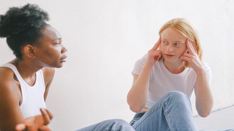 two people having a conversation