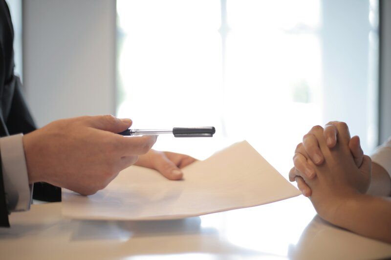 man pointing with a pen