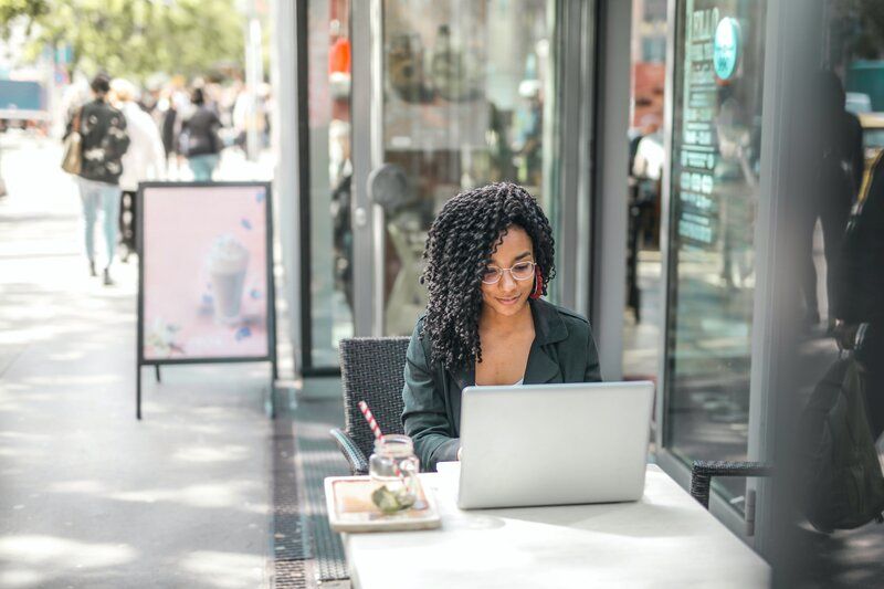 woman on a laptop outside