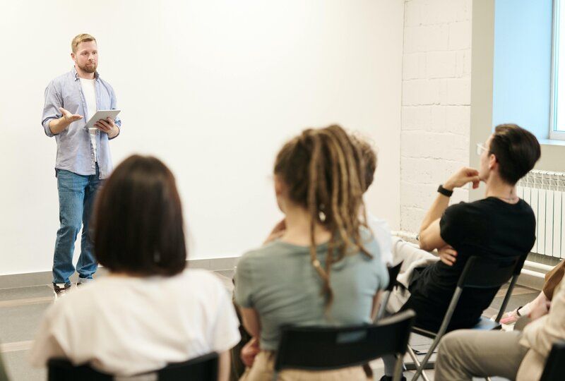 man speaking to an audience