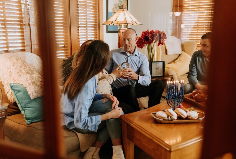 a family celebrating hanukkah