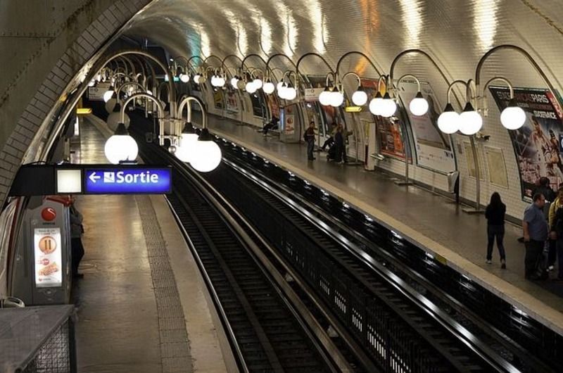 Subway passing through station.