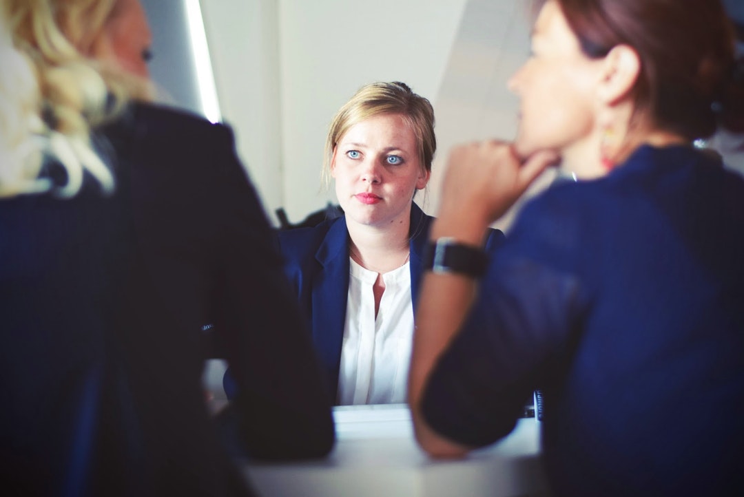 Woman Sitting At Desk