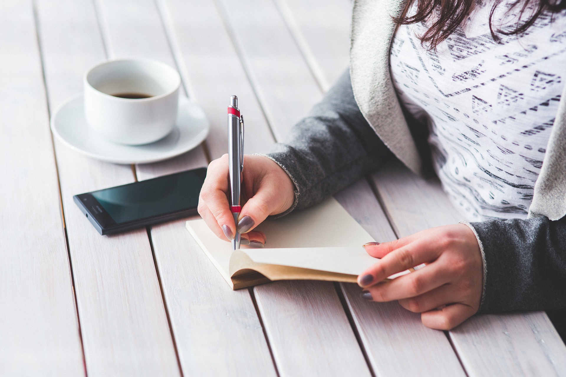 woman writing notes