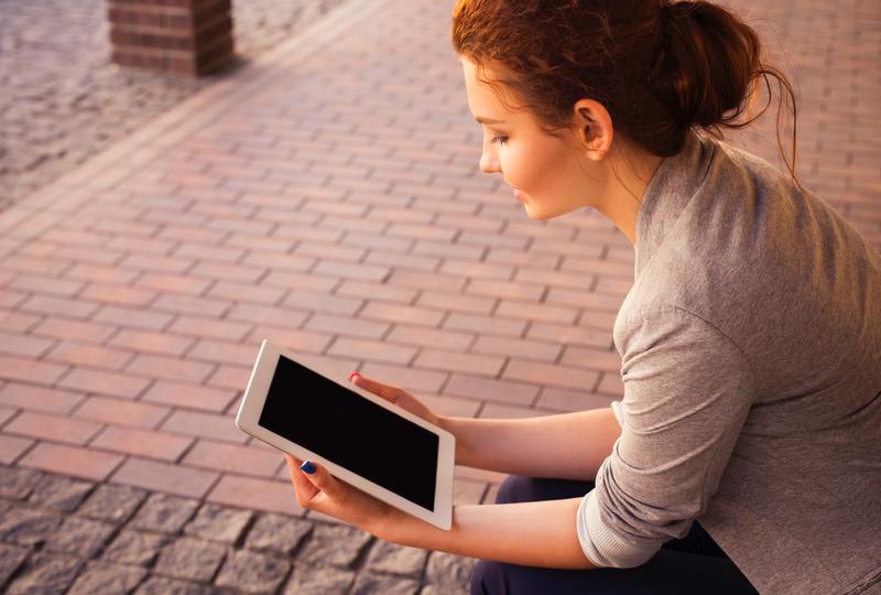 Woman holding tablet