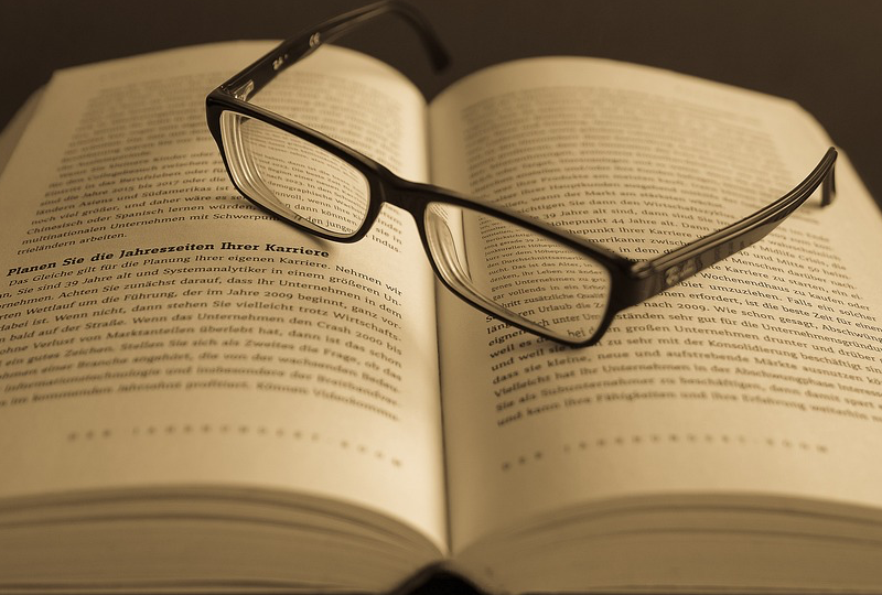 Glasses on book